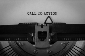 Typewriter which has written "call to action" on a page