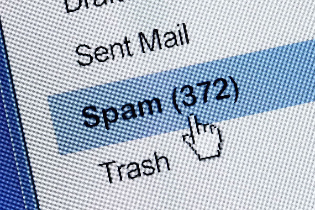 Computer mouse over a spam inbox with 372 emails